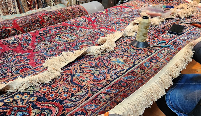 repairing rug by hand