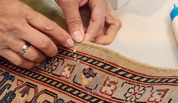 Close-up view of damage on rug