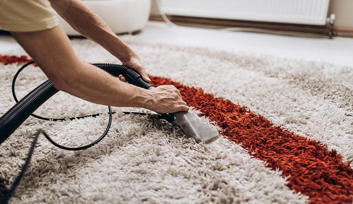 Shag rug cleaning using vacuum cleaner